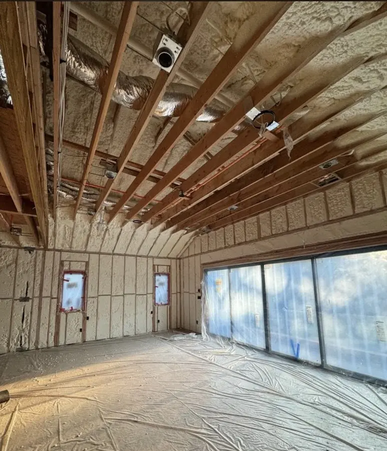 Interior walls and ceiling insulated with spray foam during new construction in Steger